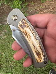 1 of 1 Custom Guppy! Fossilized Ivory Inlay, Deleted Tab Stonewashed Blade, Thumb Stud, Bronze Anodized scales and hardware and Chad Nichols Moka Ti Clip!