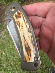 1 of 1 Custom Guppy! Fossilized Ivory Inlay, Deleted Tab Stonewashed Blade, Thumb Stud, Bronze Anodized scales and hardware and Chad Nichols Moka Ti Clip!